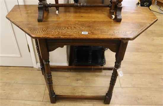 A reproduction oak credence table W.107cm